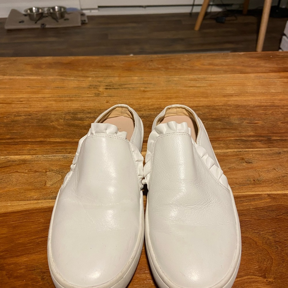 Kate Spade White Slip-On Sneakers with Ruffle Detail